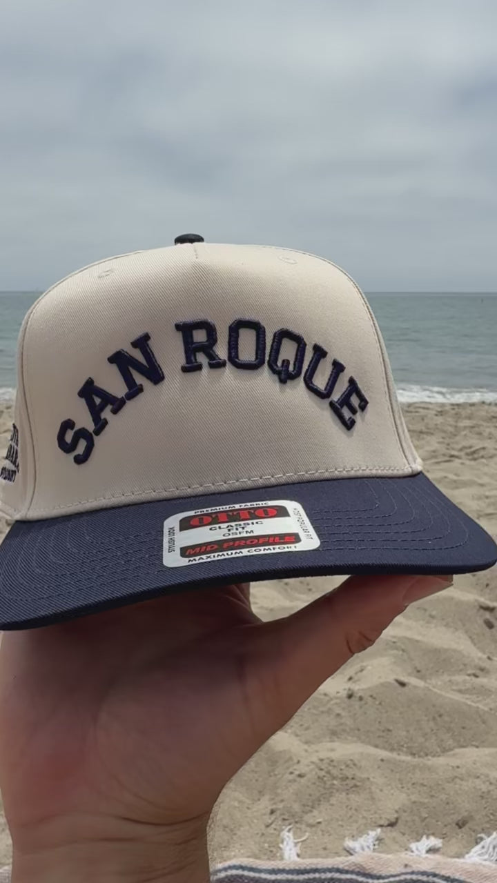 San Roque 3D Puff Snapback Hat – Natural/Navy